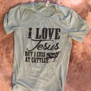 I love Jesus but cuss at cattle graphic tee